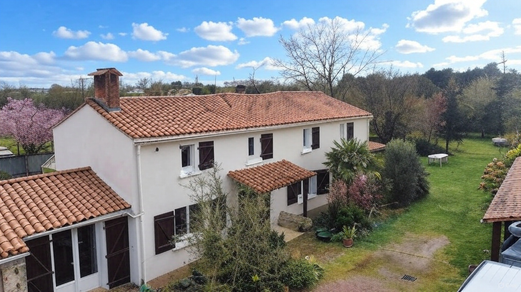 Maison avec grand terrain